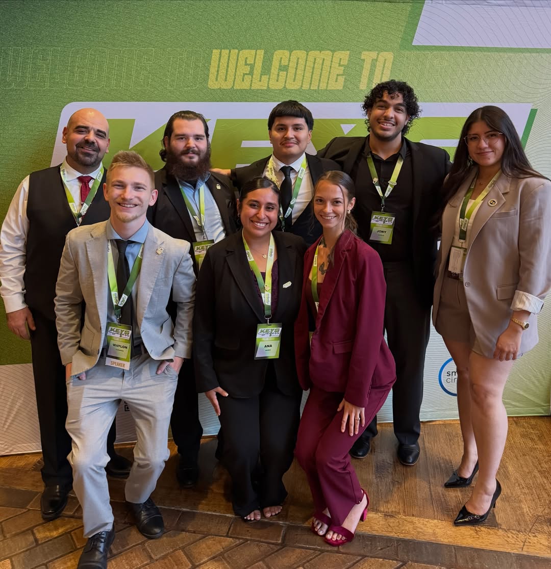 Core Agency team members posing together at a conference in Dallas